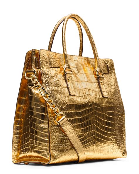 michael kors large gold tote.